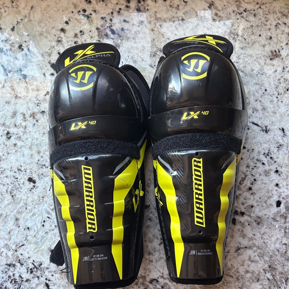 Warrior Black and Yellow Shin Guards ice hockey